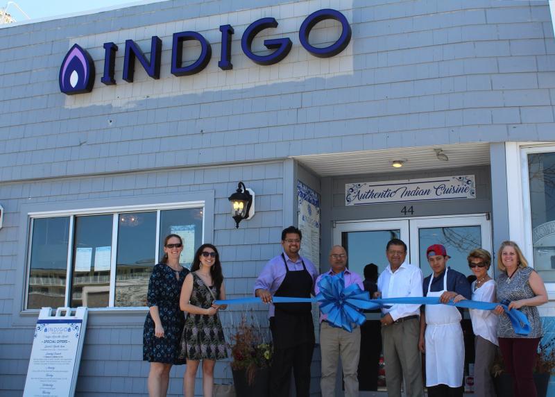 On hand for the Indigo Restaurant ribbon cutting are (l-r) Meghan McCalley and Emily Grothey, Rehoboth Beach-Dewey Beach Chamber of Commerce; Raghu Kumar; Sandeed Kumar; Suraj Kumar; Napolean Carcamo; chamber President and CEO Carol Everhart; and Mariella Trosko, chamber representative. SUBMITTED PHOTO
